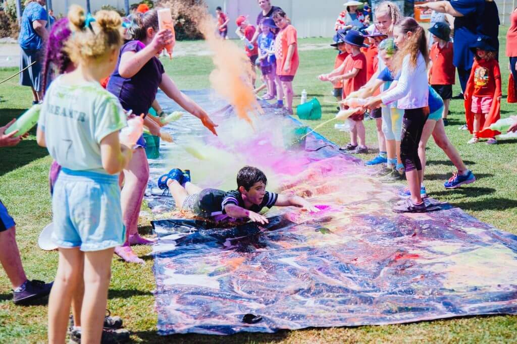 A slip and slide is one of the best fun run obstacles.